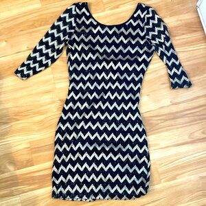 Black and gold lace bodycon dress with low back